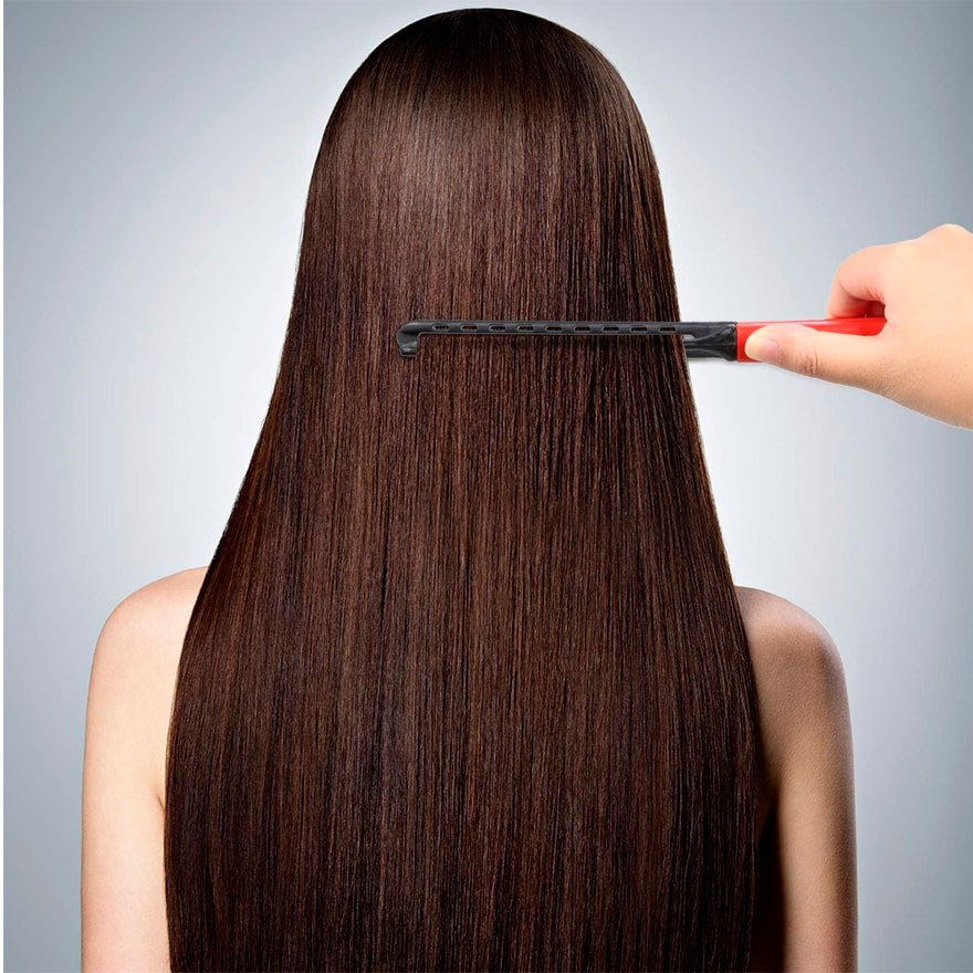 Comb-iron for drying hair with a hairdryer and for leveling with an iron, pink with black