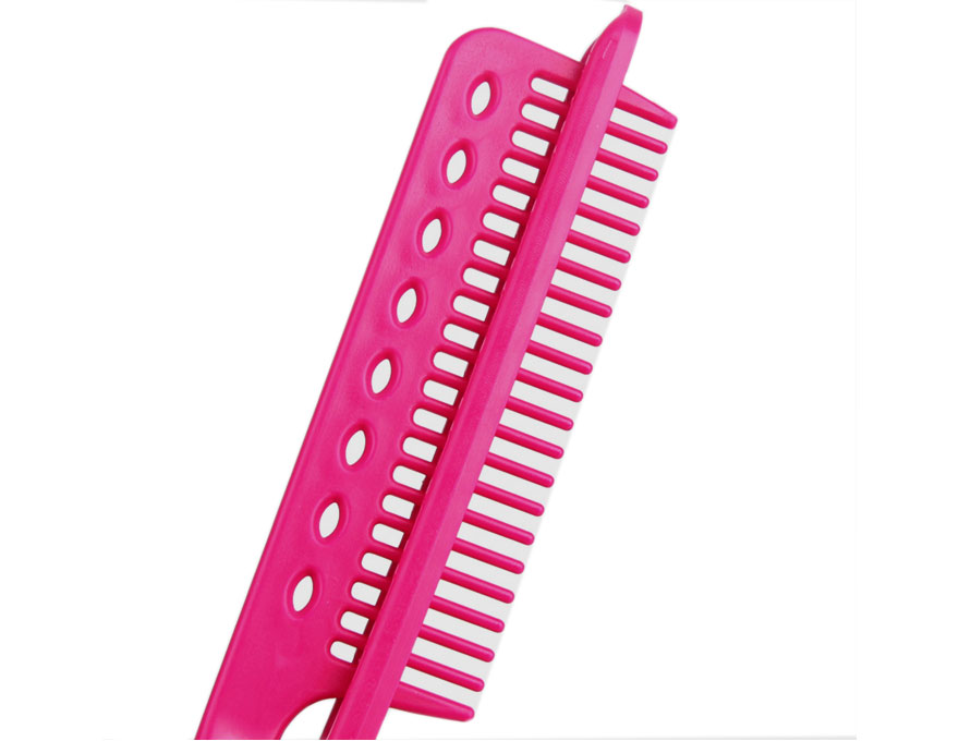 Comb-iron for drying hair with a hairdryer and for leveling with an iron, pink with black