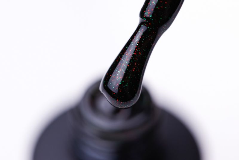 OXXI Gel nail polish No. 239 (black with red and green micro-shimmer), 10 ml