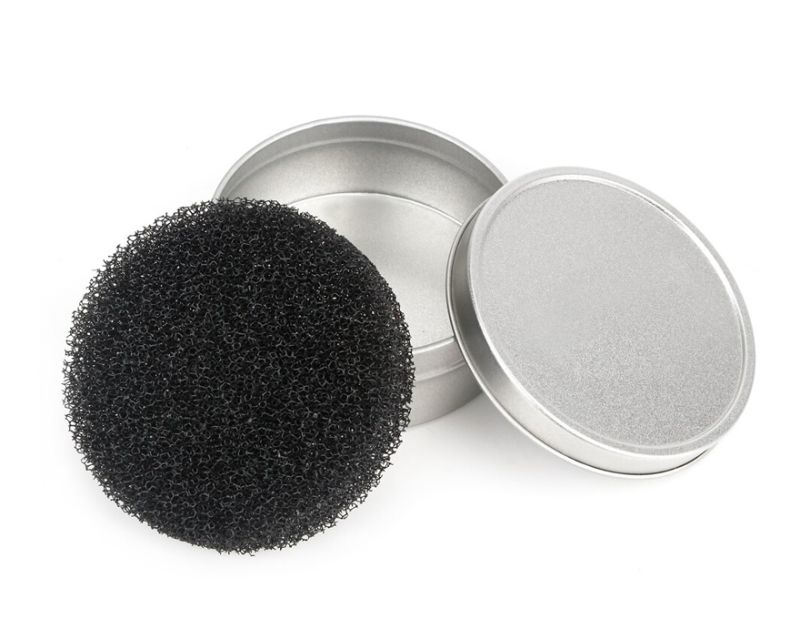 Metal box with a sponge for cleaning brushes
