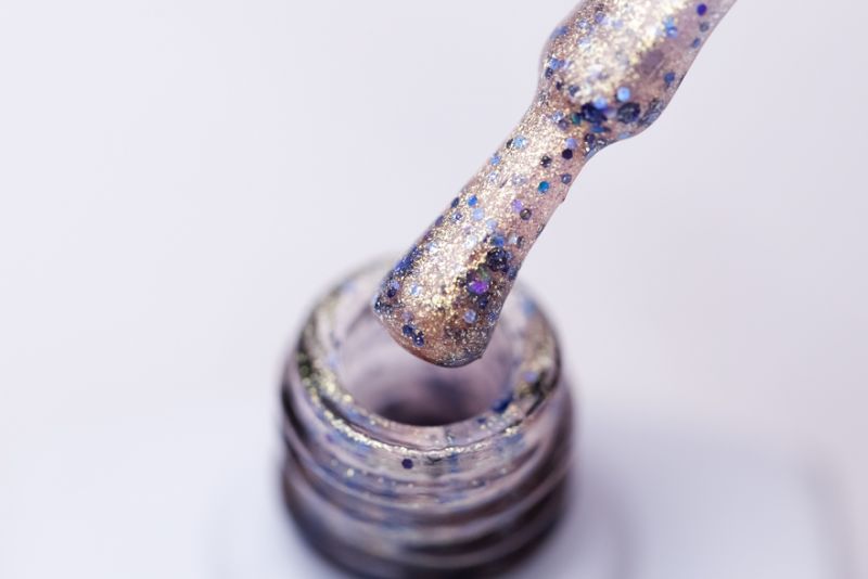 Molekula gel varnish No. 084 (transparent with gold microgloss and blue sparkles), 11 ml
